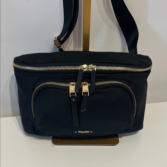 Tumi Handbags - Tumi Madison Black Nylon Belt Bag with Gold Hardware Accents